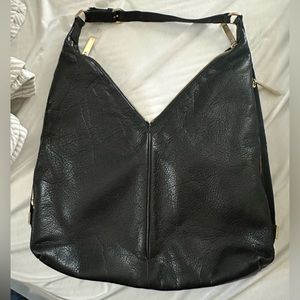 Edgy chic black leather purse
